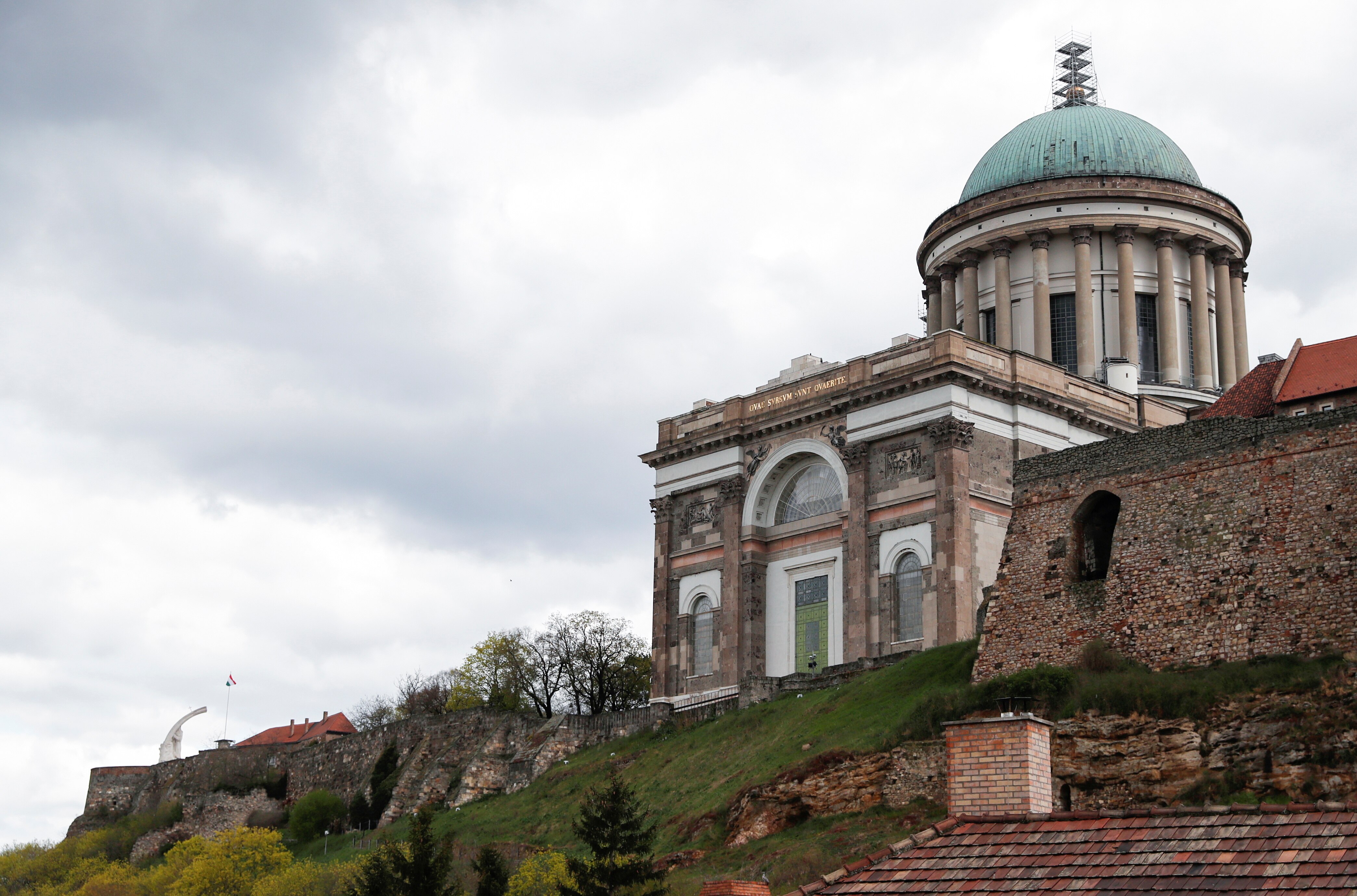 A large cathedral on a hill.