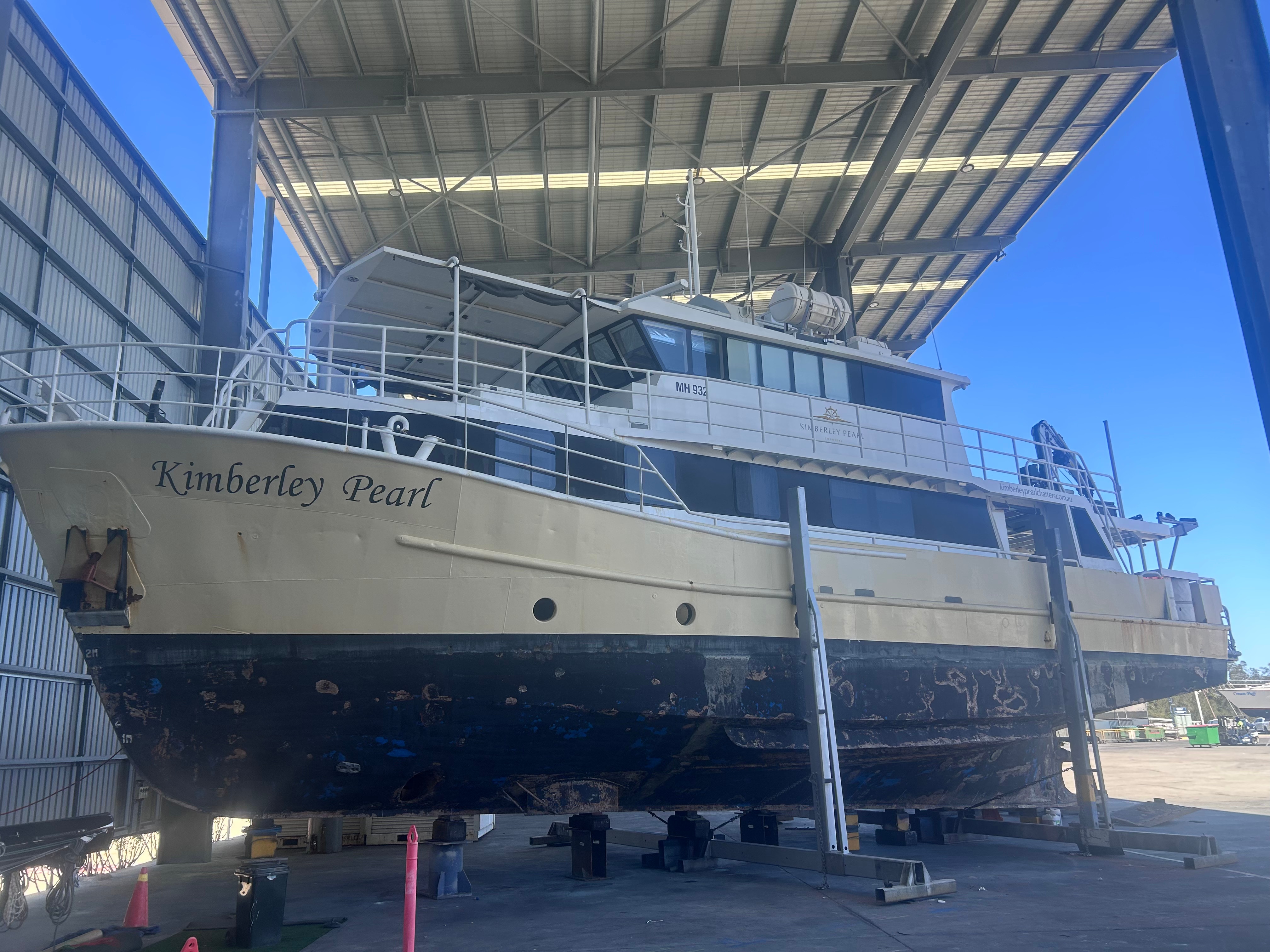 A large boat on a stand.