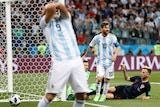 Argentina's Lionel Messi reacts to missing goal against Croatia