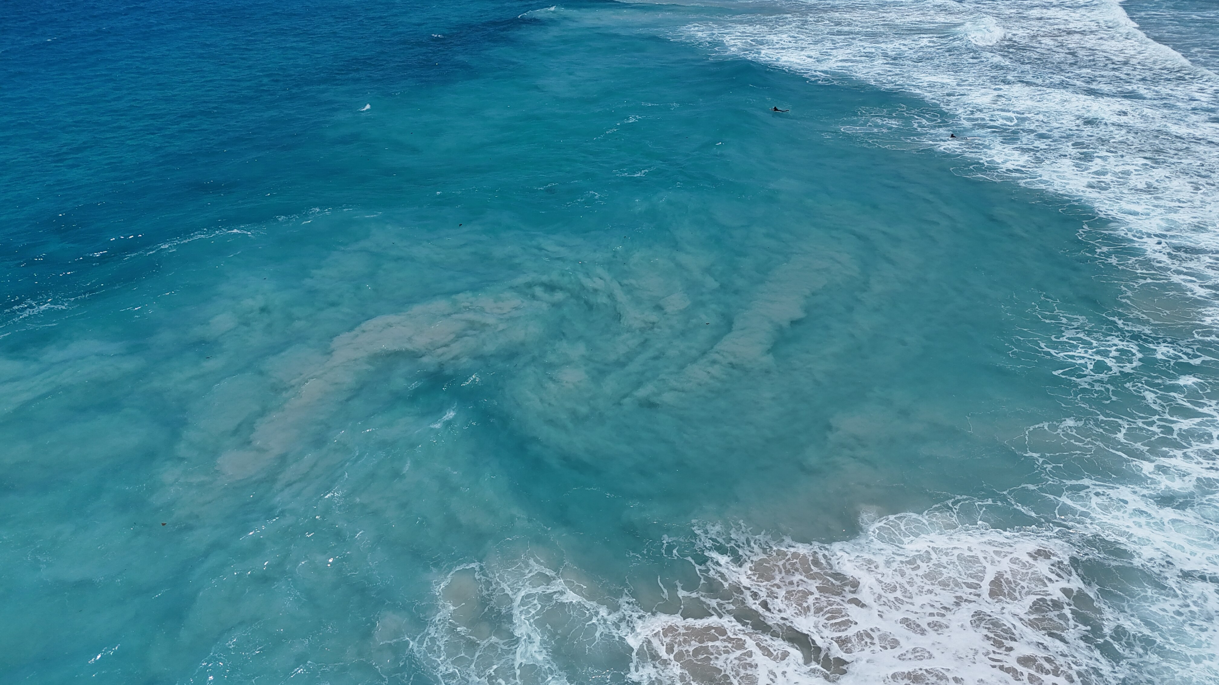 A rip current taken from an aerial view.
