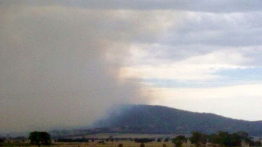 Smoke rises from a bushfire in Mount Buangor State Park