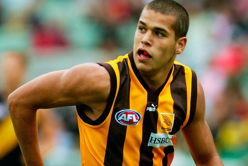 A fresh-faced Lance Franklin runs in his Hawthorn jersey