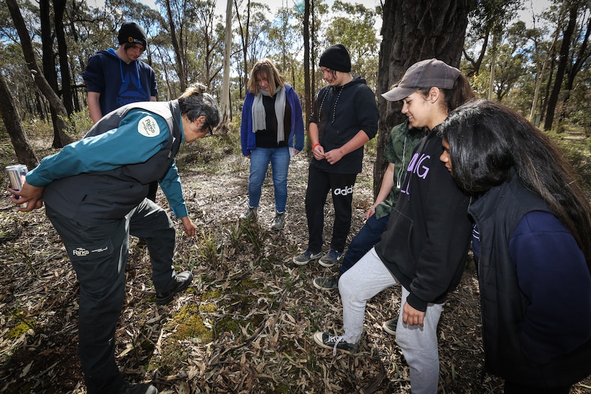 Dja Dja Wurrung Parks Vic Park Ranger Sharnie Hamilton teaching the students about plant recognition.