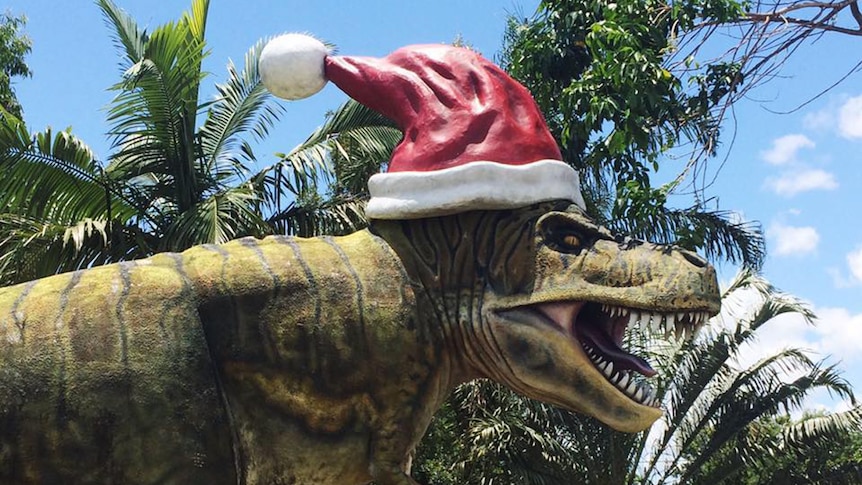 Dinosaur with hat.