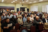 About 150-200 people fill a room in Mildura's Alfred Deakin Centre.
