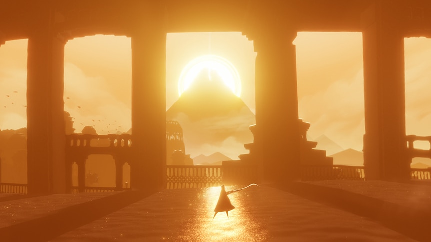 Art from Journey: a desert traveler in red robes and a red scarf, in a tunnel, gazing upon the sunset behind a distant mountain.