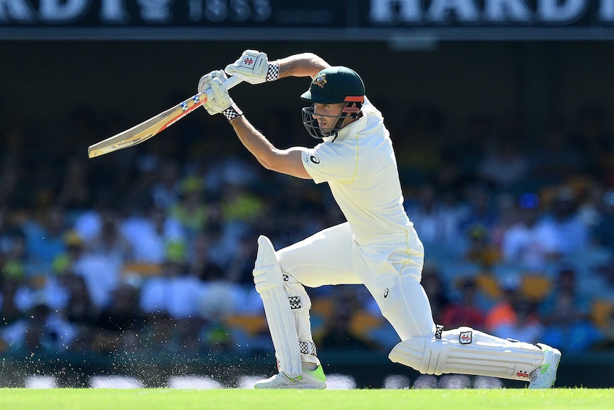 Shaun Marsh plays a shot down the ground at the Gabba on day two of the first Ashes Test.