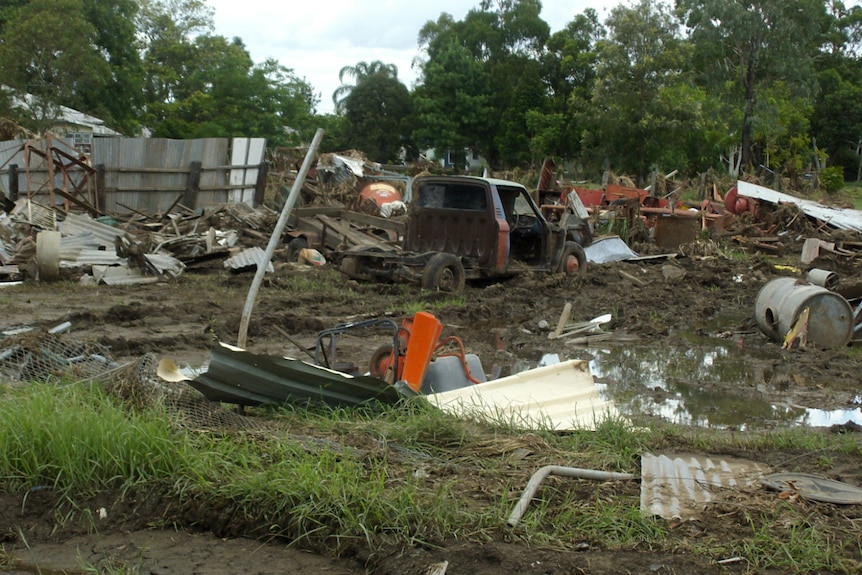 A destroyed vehicle and other possessions are seen in Grantham on January 19, 2011, just over a week after deadly flash floods.