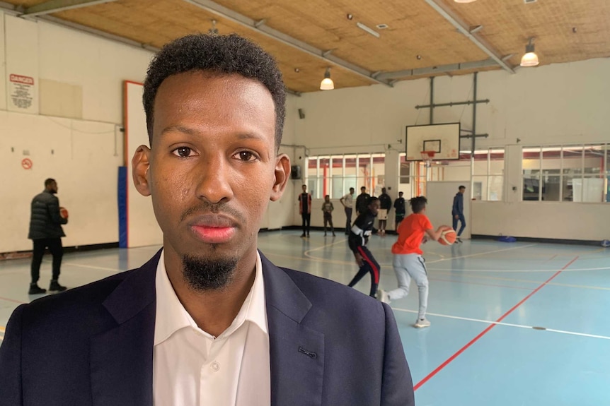 Flemington Hub volunteer Abdi Ali was 'shocked' when he heard about the funding cut.