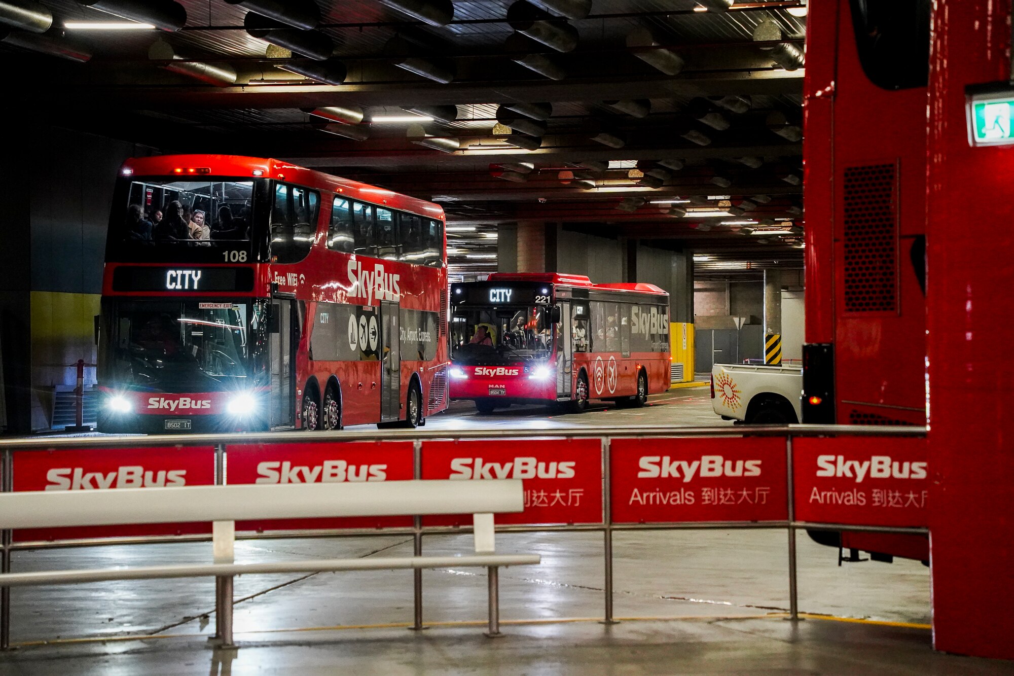 Photos of two skybuses idling at Southern Cross station