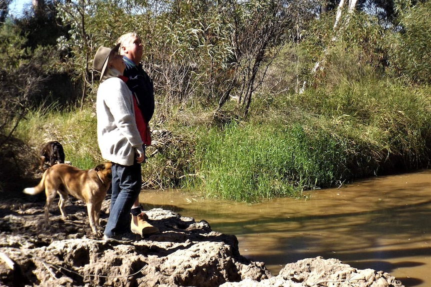 Glenn Beasley and his wife Barbara on their property that adjoins the We Kando waste facility.