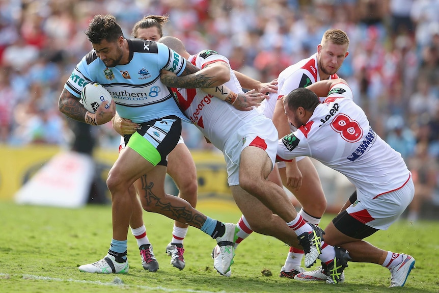 Andrew Fifita bursts through against the Dragons