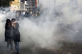 New clashes: Witnesses said police beat protesters with batons and fired tear gas.