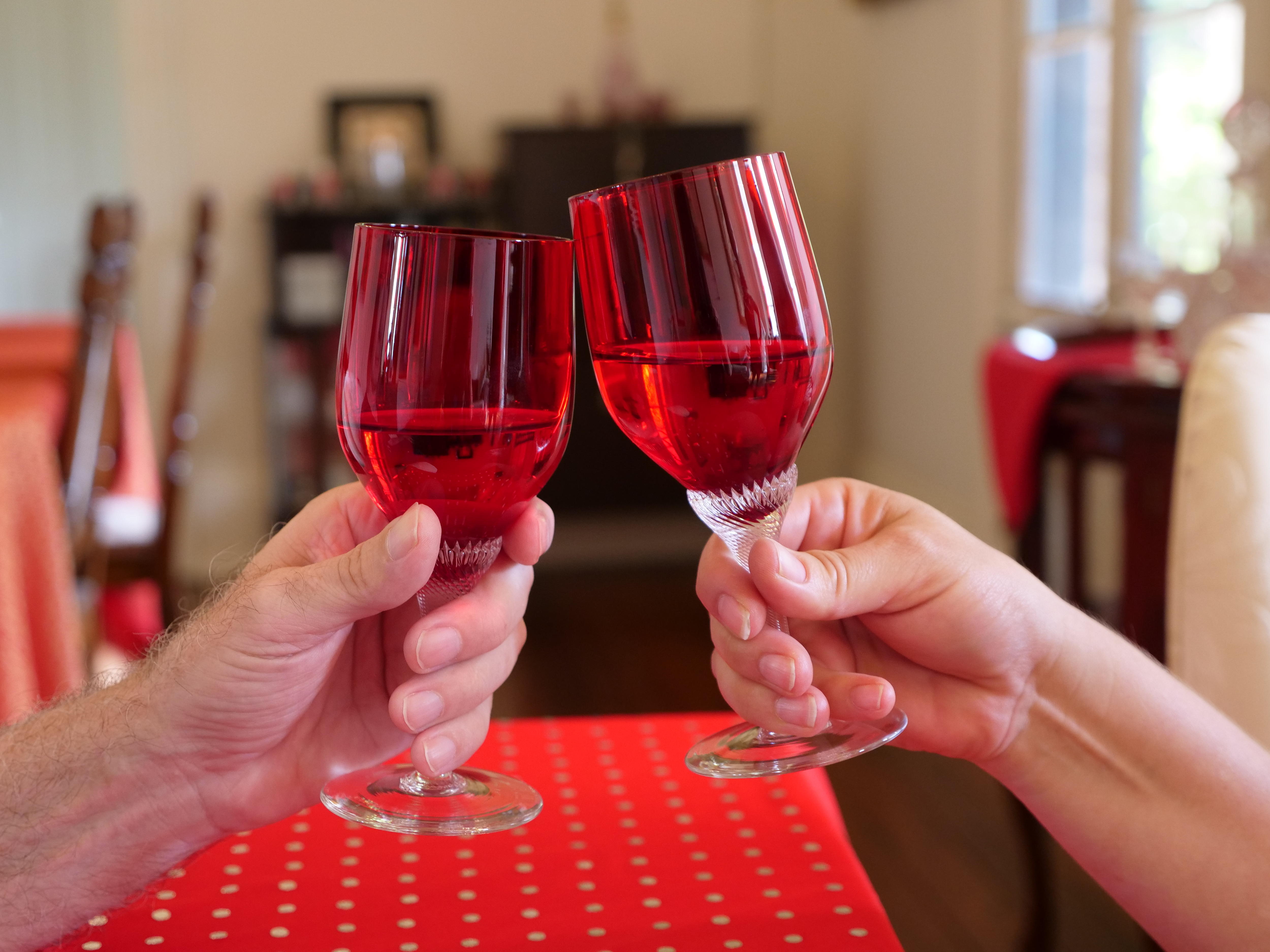 Wine glasses clinking at Wingham House, on the Mid North Coast