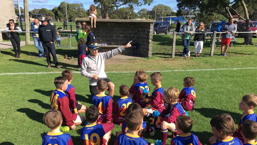 Coach speaks to junior team