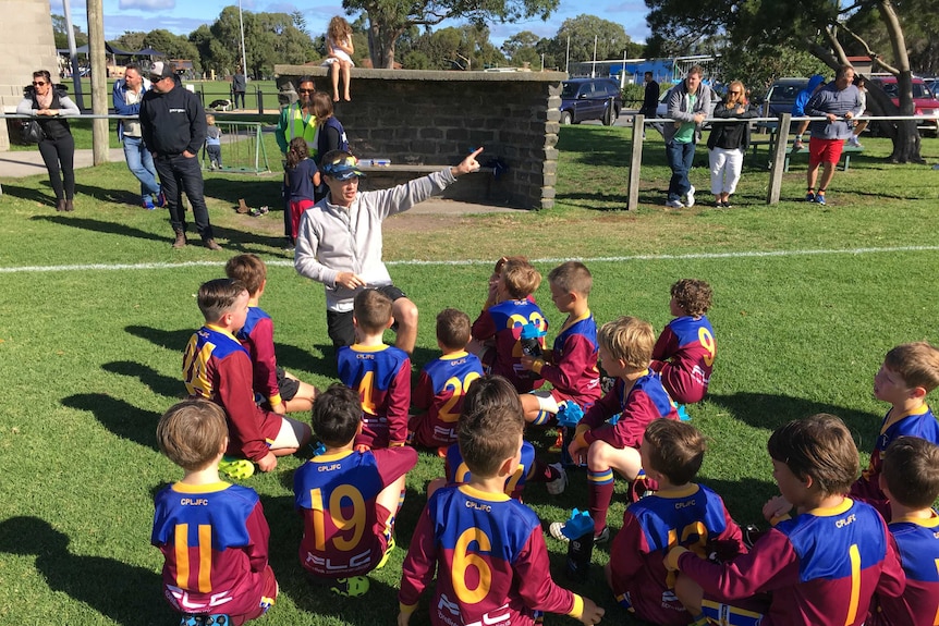 Good coach speaks to his team