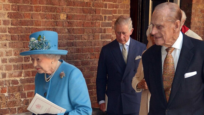 Queen Elizabeth II and Prince Philip leave the Chapel Royal following the christening.