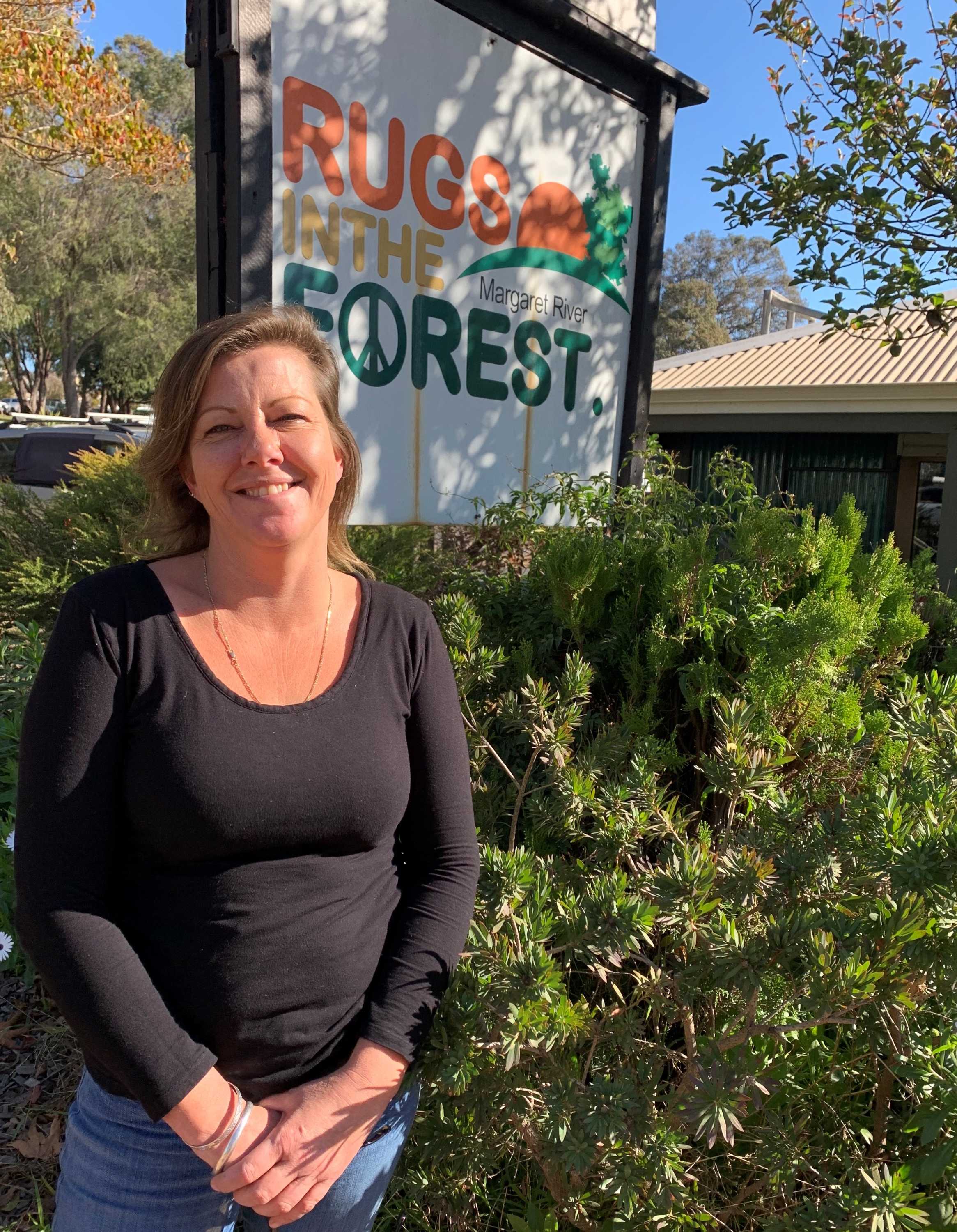 Owner of Rugs in the Forest, Tanya Franchi stands in front of the shop she has owned for 12 years