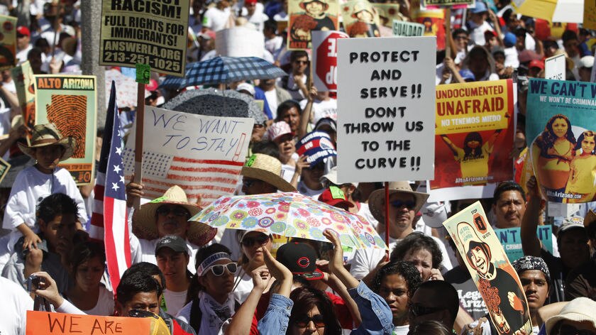 Demonstrators protest against Arizona's controversial immigration laws.