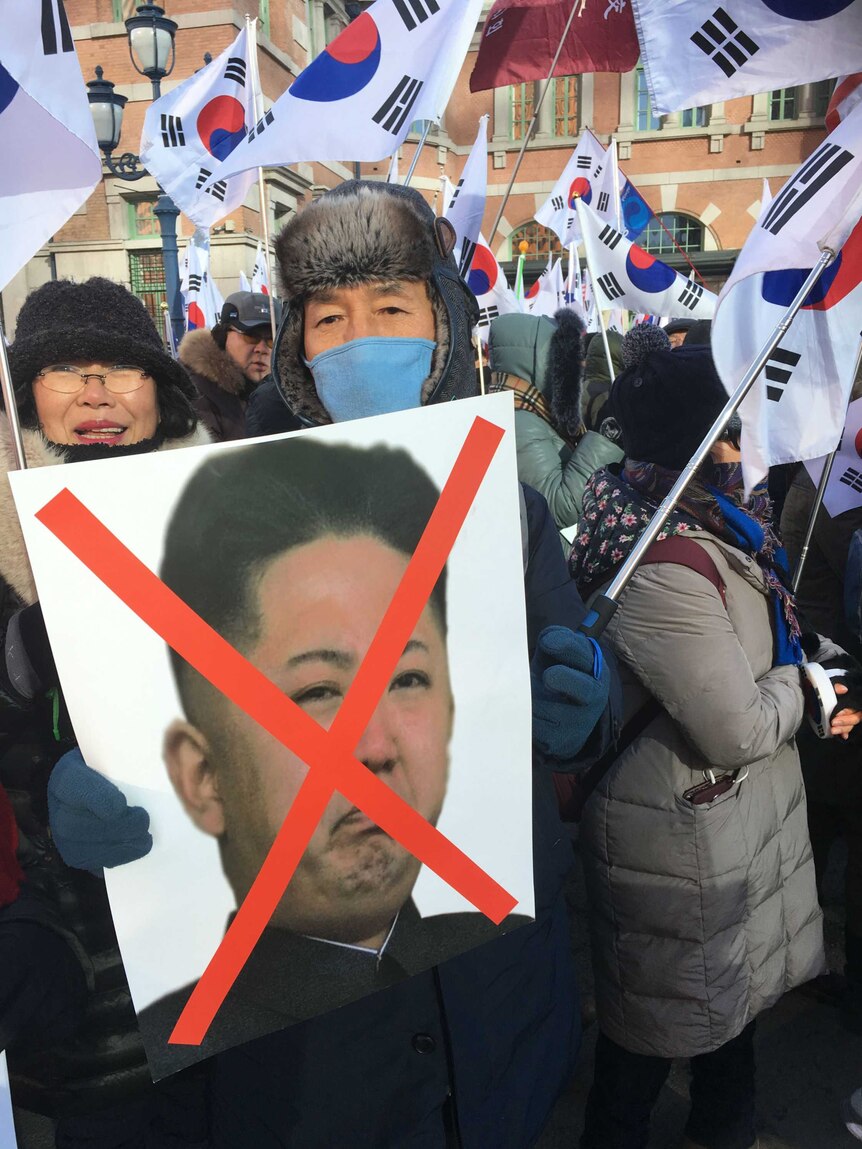 Anti-North Korean sentiment pours out onto the streets of Seoul.