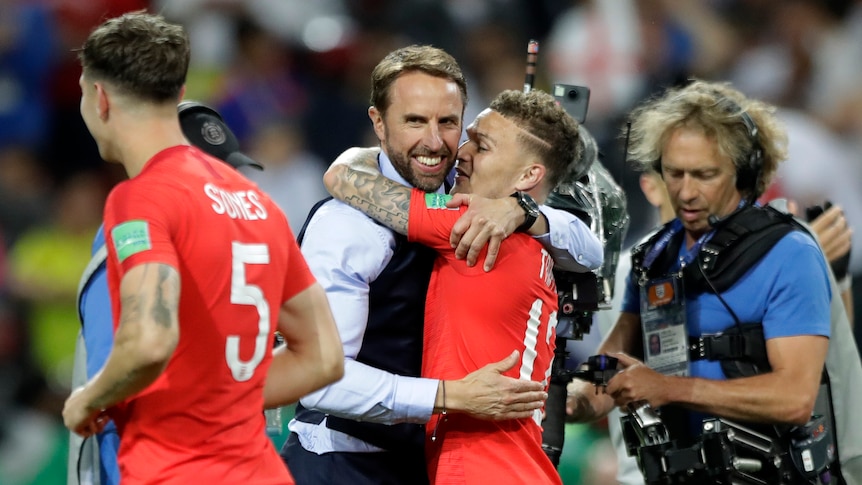 England's Kieran Trippier embraces coach Gareth Southgate