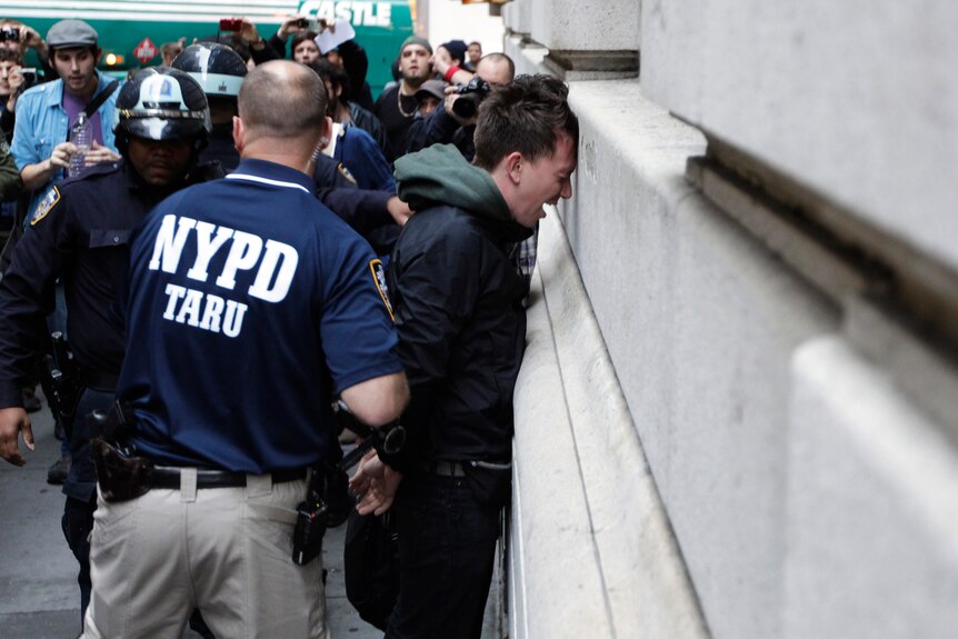 New York Police Department officers arrest a member of the Occupy Wall Street movement