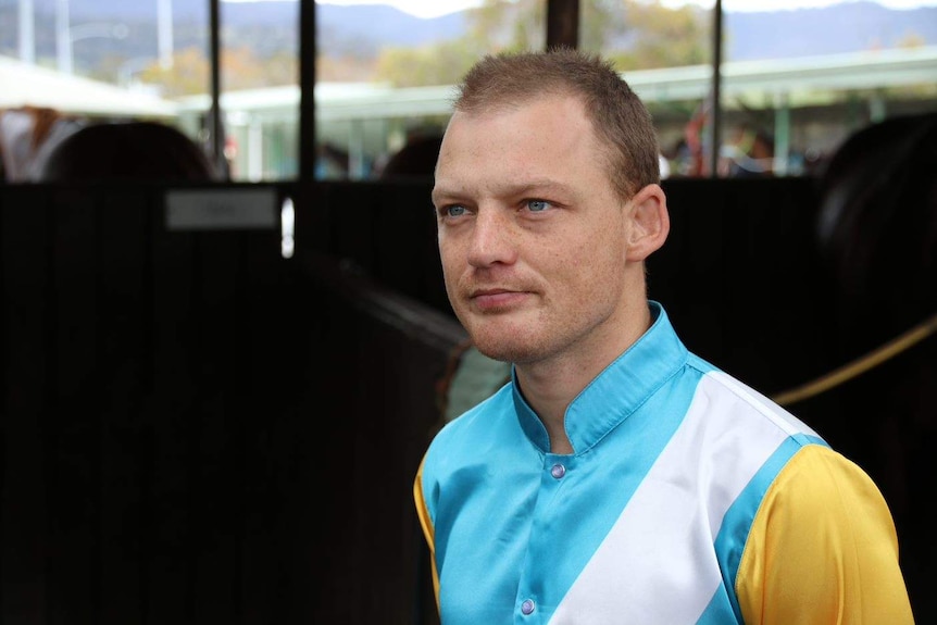 Jockey Jason Maskiell in his racing silks at Elwick Racetrack in Tasmania.