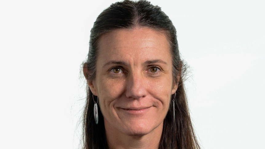 Portrait of a smiling Professor Nicole Webster