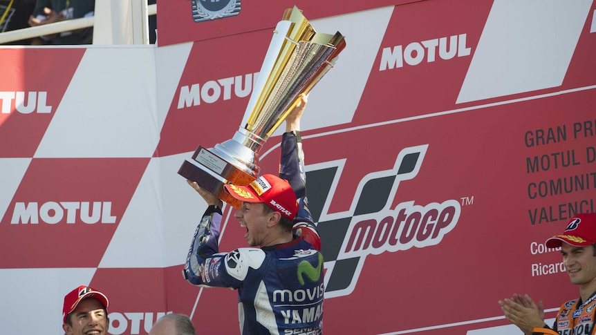 Jorge Lorenzo of Spain celebrates winning the MotoGP world title
