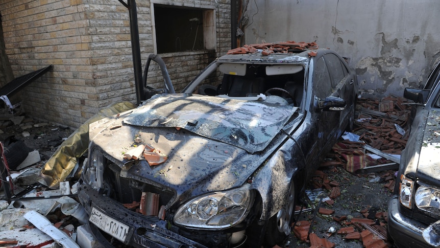 Damage from twin Damascus car bombings