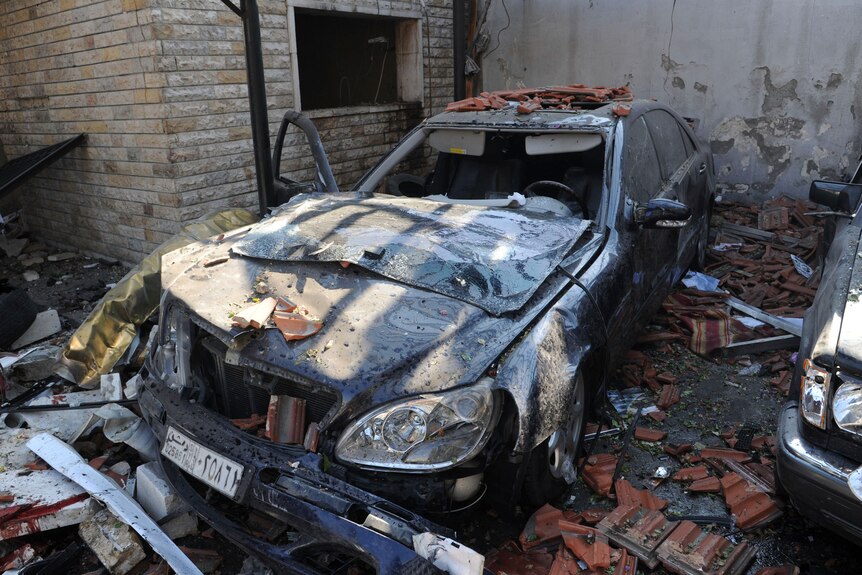 Damage from twin Damascus car bombings