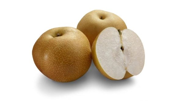 two whole pears and one pear cut in half on white background with shadow beneath