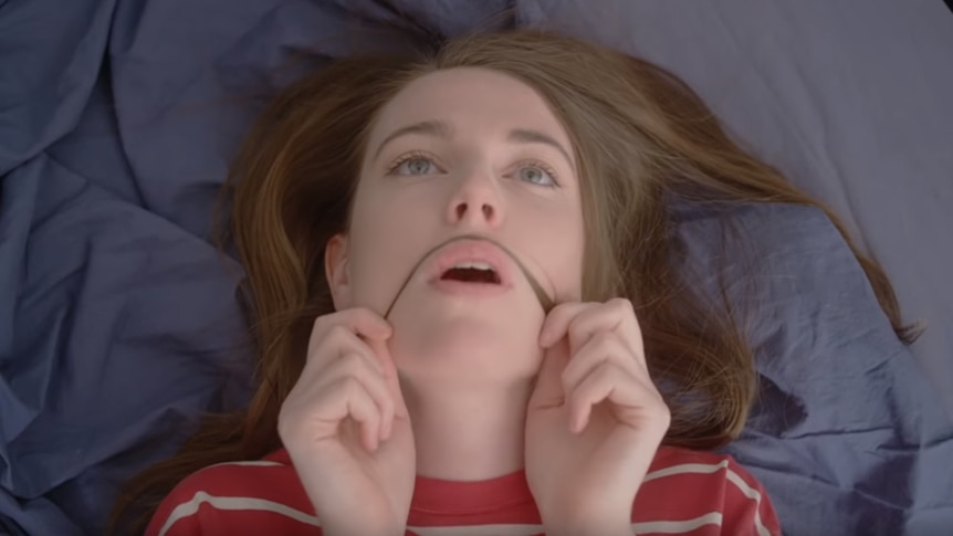 A still of Angie McMahon from her 2019 music video 'Pasta'
