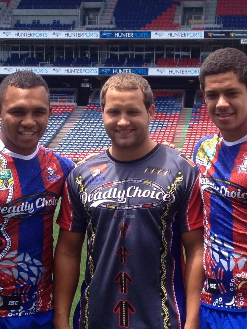 Tyrone Roberts (centre) has signed a new two year deal with the Newcastle Knights.