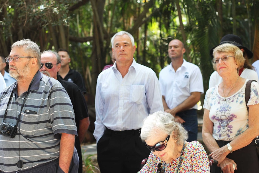 A man in an audience.