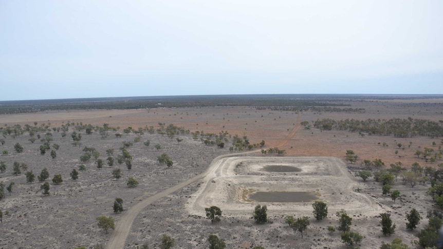 Empty dams in dry paddocks