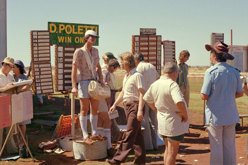 Archival image of Wittenoom residents at the racecourse, c. 1975.