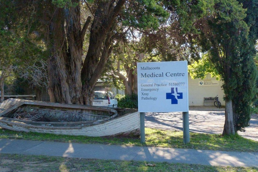 A sign for Mallacoota Medical Centre outside clinic.