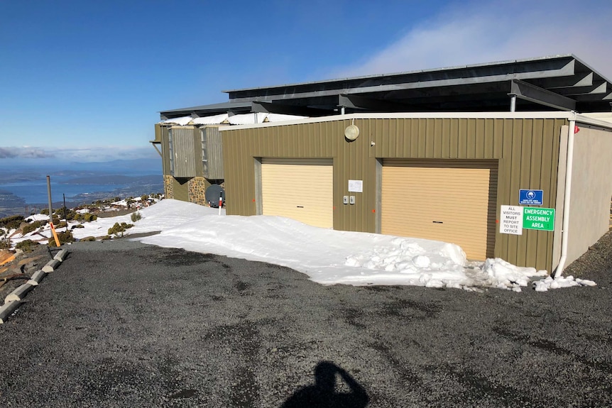 The living quarters at the site of the Transmission Tower on top of Mount Wellington with snow.