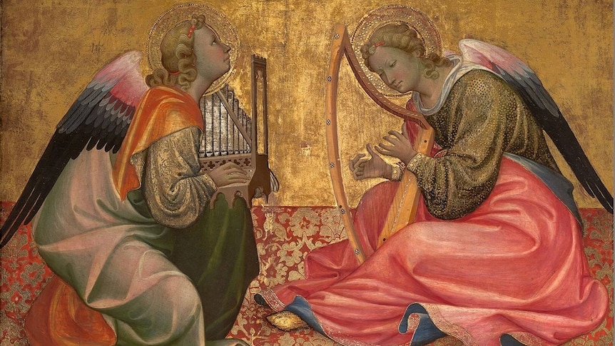 Two seated angels making music