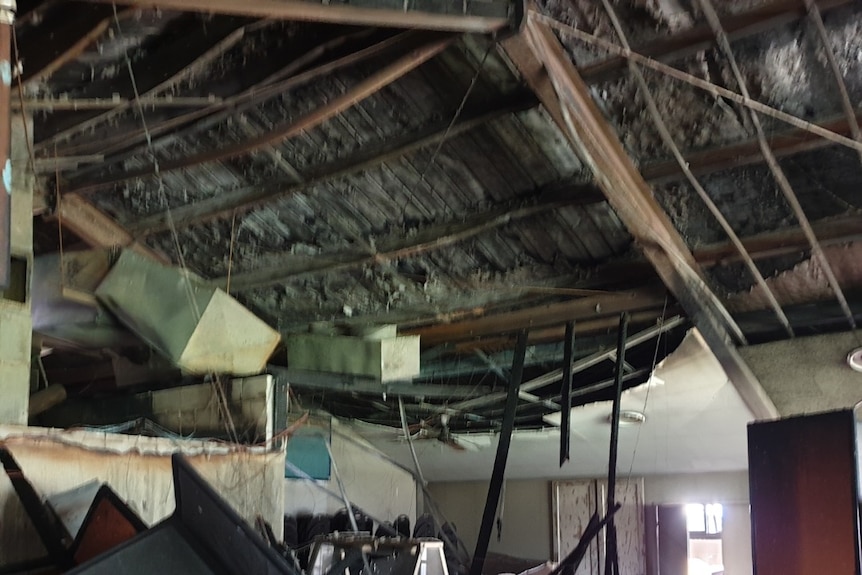 Burnt debris and fire damage under collapsed kitchen roof Cudgen Leagues Club