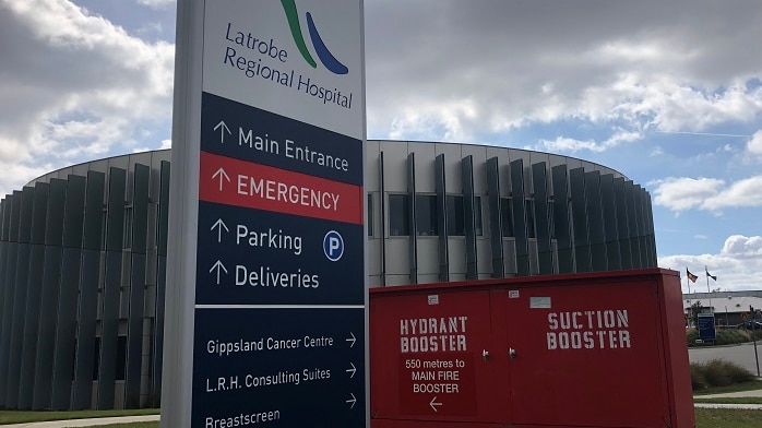 A sign saying Latrobe Regional Hospital outside a building in Traralgon.