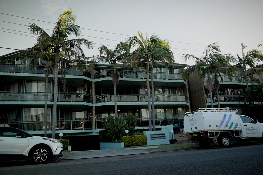 the outside of a beachside apartment complex