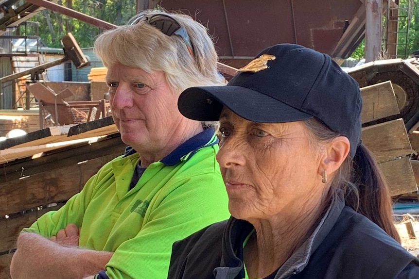 Fred Broxam (centre) with Denise Broxham (right) in a mill yard.