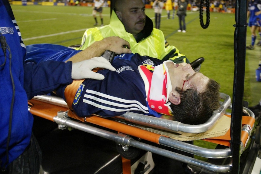 Steve Devine sustains a neck injury in 2003.