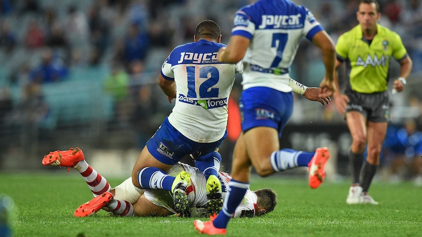 The Bulldogs' Frank Pritchard comes in late with his knees on the Dragons' Gareth Widdop