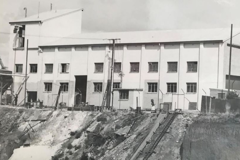 A black and white photo of a factory