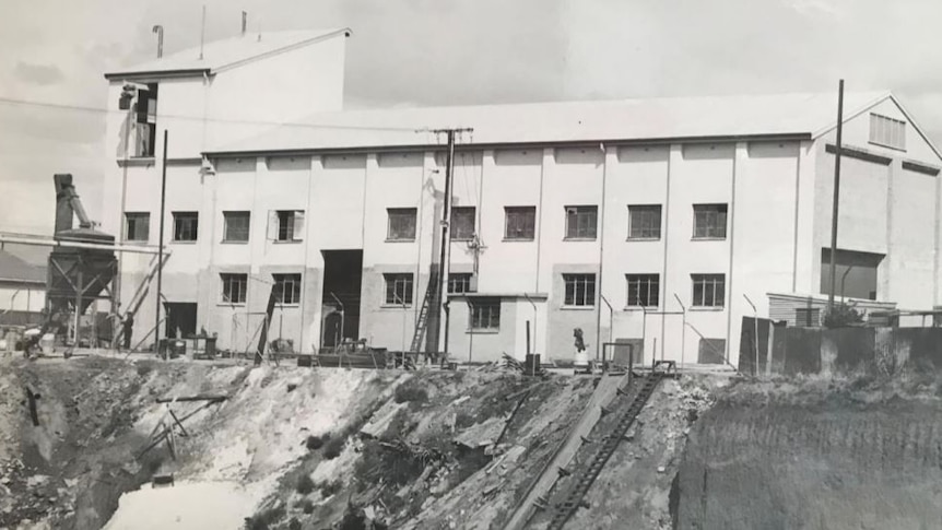 A black and white photo of a factory