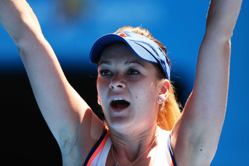Agnieszka Radwanska celebrates a win at the Australian Open