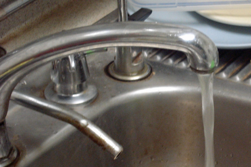 Water running out of a kitchen tap